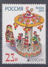 1910 Россия 2015 год. Игрушки. (Е). Карусель и матрёшки.